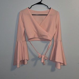 Pink v-neck top with tie and bell bottom sleeves from forever 21 size small
